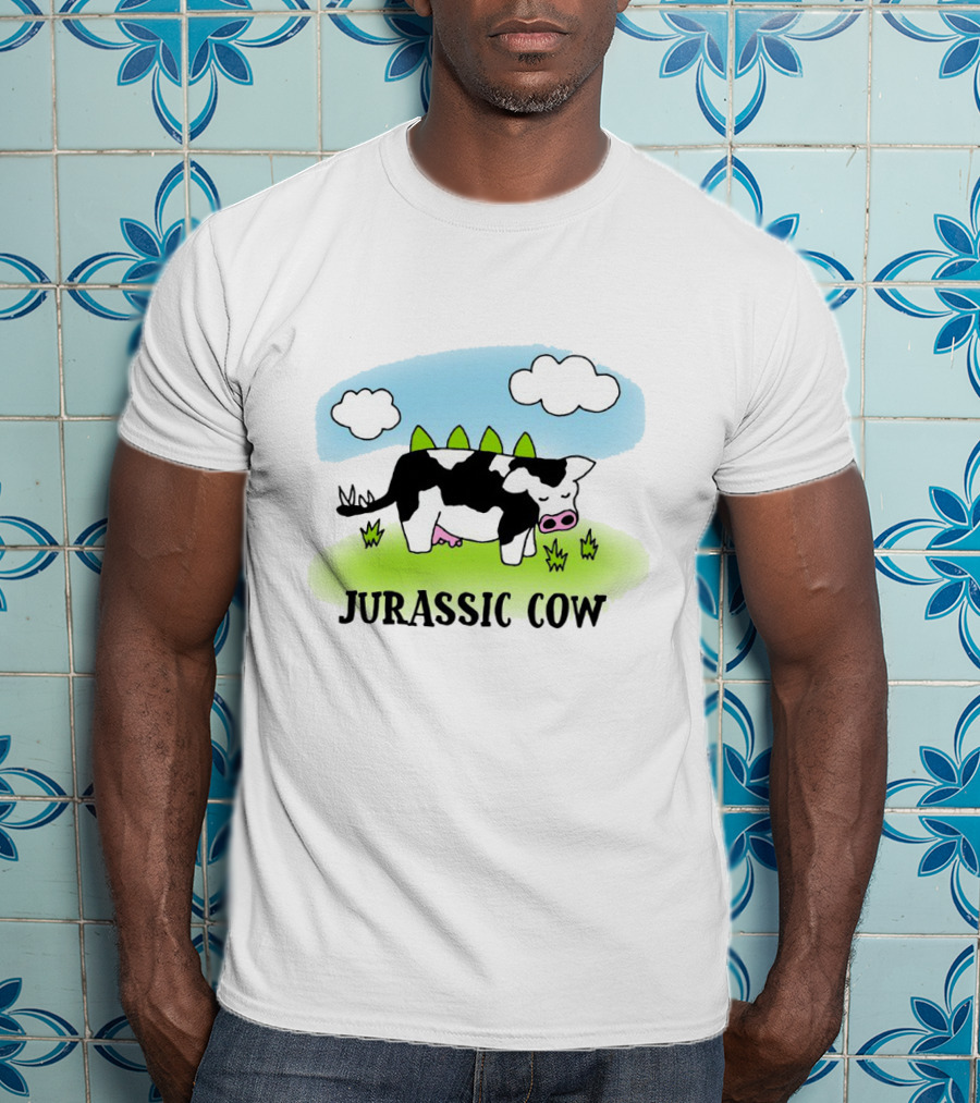 Jurassic Cow Grazing With Dinosaur Spikes Under Blue Sky And Clouds In Cartoon T-Shirt