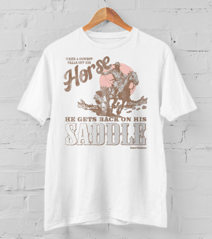 When A Cowboy Falls Off His Horse He Gets Back On His Saddle T-Shirt