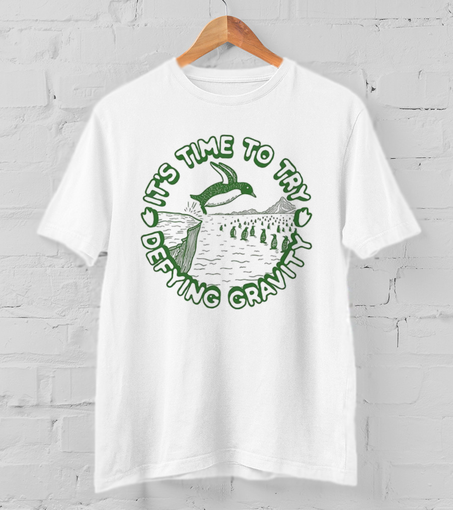 It's Time To Try Defying Gravity Penguin Jumping Scene T-Shirt