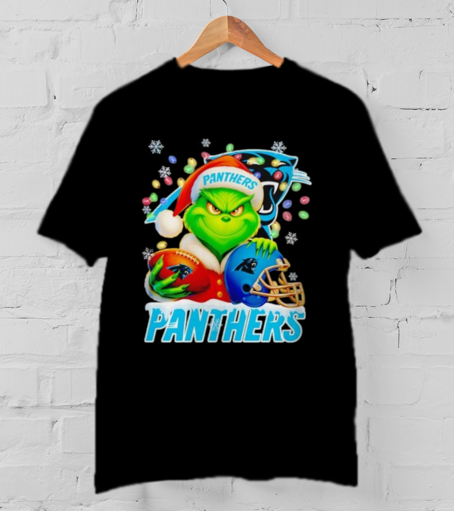 Grinch Santa Hat Holding Carolina Panthers Football And Helmet Merry Christmas T-Shirt