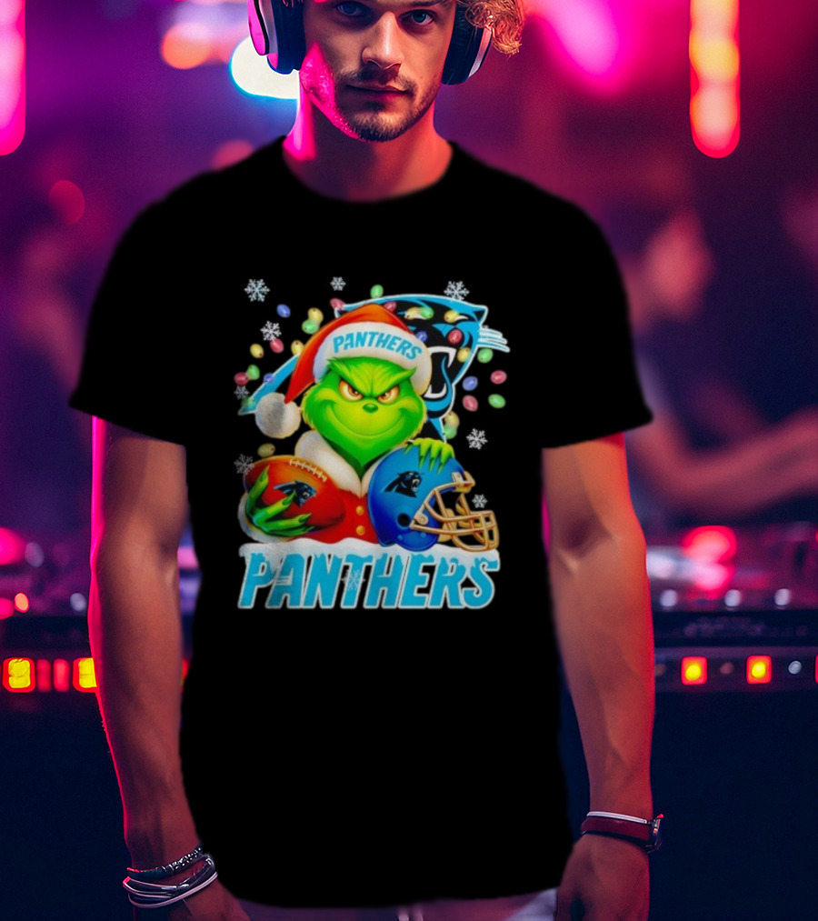 Grinch Santa Hat Holding Carolina Panthers Football And Helmet Merry Christmas T-Shirt