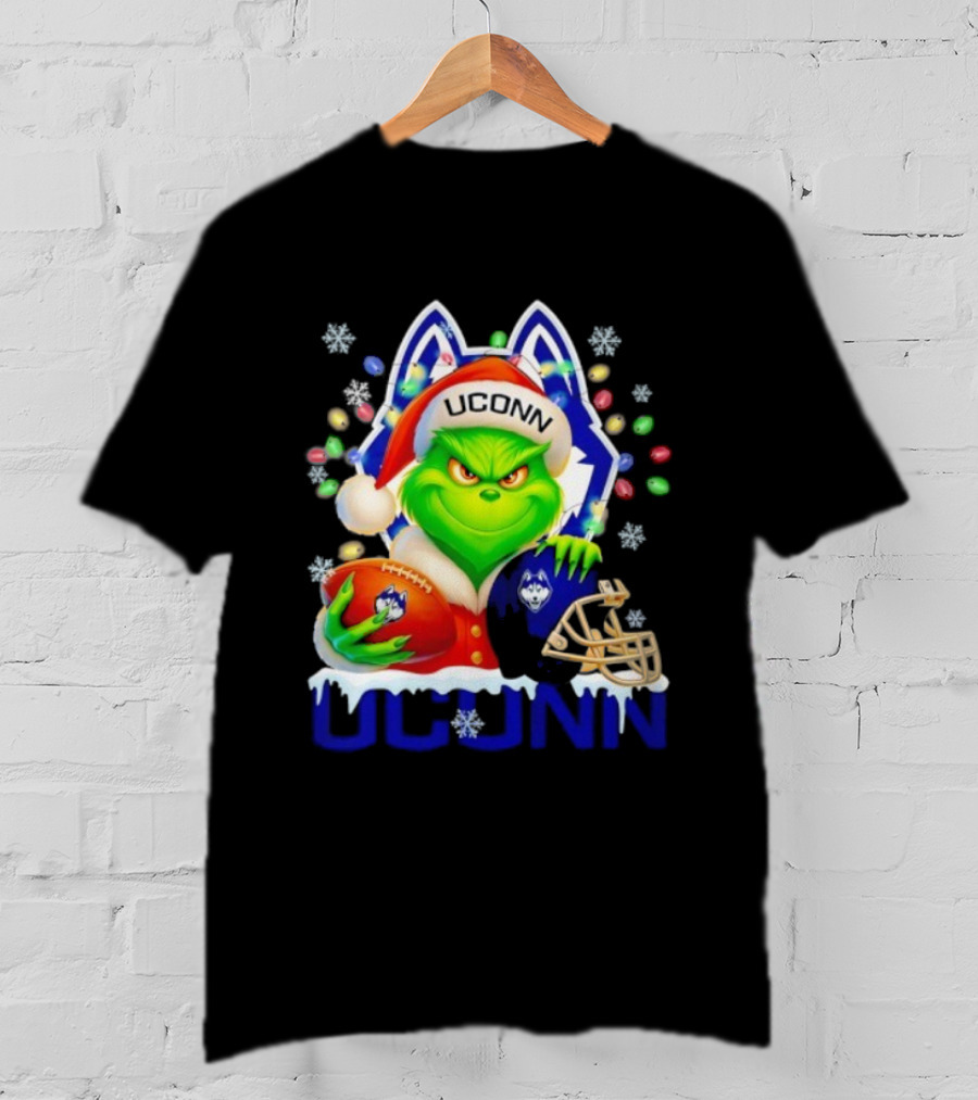 Grinch Wearing Santa Hat With UConn Huskies Football And Helmet Merry Christmas T-Shirt