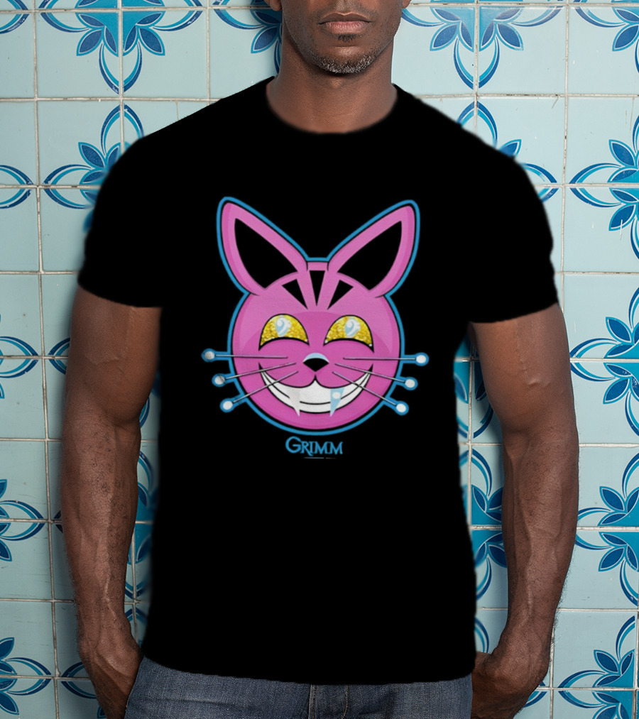 Grimm Retchid Kat Pink Cartoon Face With Yellow Eyes And Blue Whiskers T-Shirt