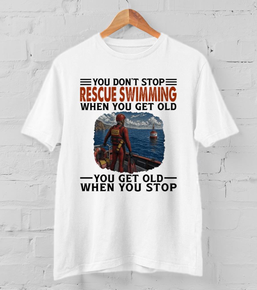 You Don't Stop Rescue Swimming When You Get Old You Get Old When You Stop Rescue Swimmer Standing On Boat Near Lighthouse T-Shirt