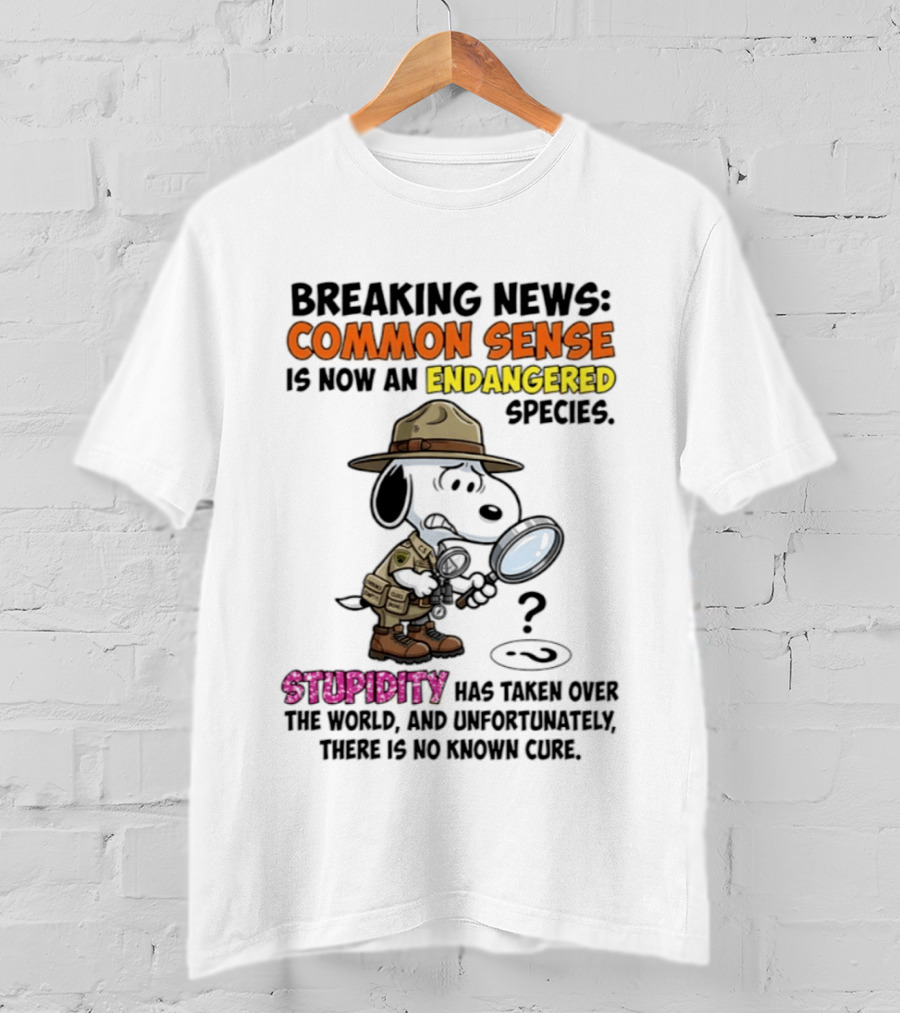 Breaking News Common Sense Endangered Species Stupidity Taken Over Snoopy T-Shirt