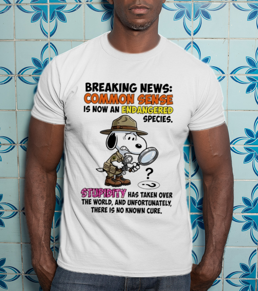 Breaking News Common Sense Endangered Species Stupidity Taken Over Snoopy T-Shirt