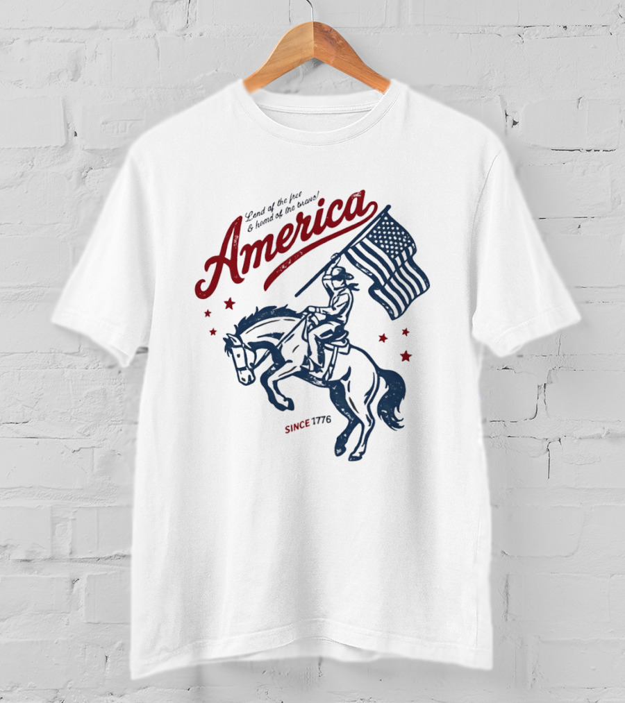 America Land Of The Free Home Of The Brave Since 1776 Cowboy Holding Flag Patriotic T-Shirt