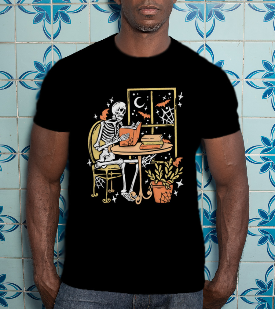 Cartoon Skeleton Reading Under Crescent Moon With Bats Orange Book Table Window T-Shirt