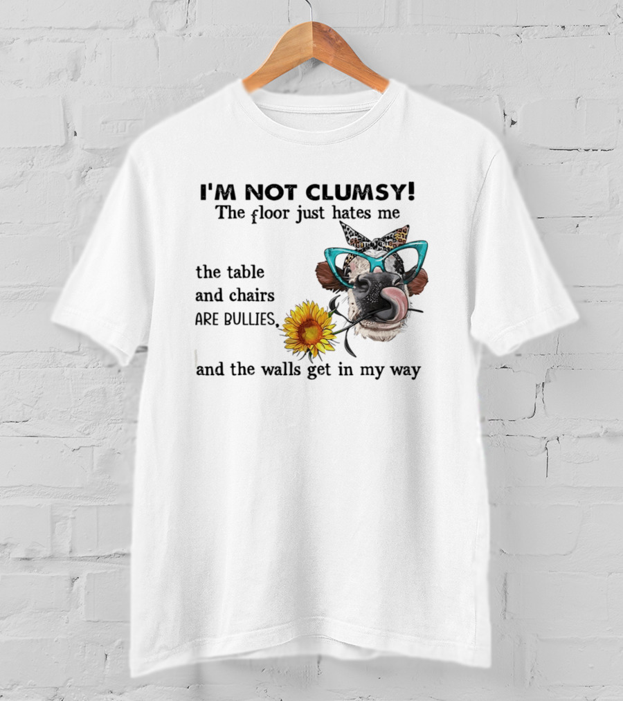 I'm Not Clumsy The Floor Hates Me The Table Chairs Bullies Walls Get In My Way Cow Sunflower Butterfly Glasses Tongue Out T-Shirt