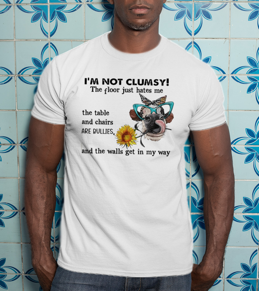 I'm Not Clumsy The Floor Hates Me The Table Chairs Bullies Walls Get In My Way Cow Sunflower Butterfly Glasses Tongue Out T-Shirt