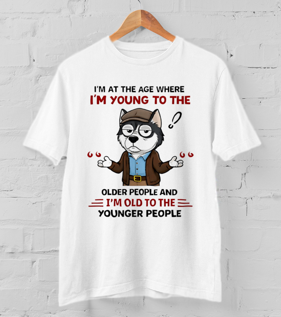 I'm At The Age Where I'm Young To The Older People And I'm Old To The Younger People Cartoon Husky Shrugging T-Shirt