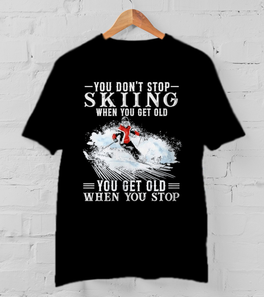 You Don't Stop Skiing When You Get Old You Get Old When You Stop Older Woman Skier Spraying Snow T-Shirt