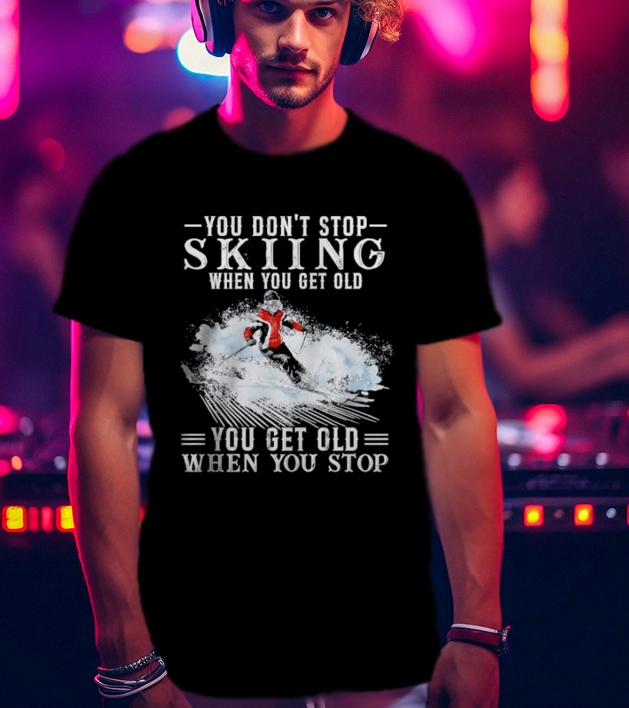 You Don't Stop Skiing When You Get Old You Get Old When You Stop Older Woman Skier Spraying Snow T-Shirt