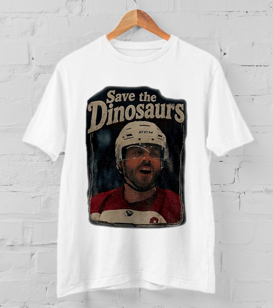 Connor Storrie Wearing Scott Hunter Save The Dinosaurs CCM Hockey T-Shirt