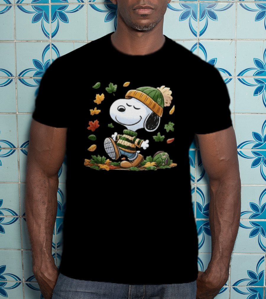 Milwaukee Bucks Snoopy In Beanie Walking Through Autumn Leaves Cartoon T-Shirt