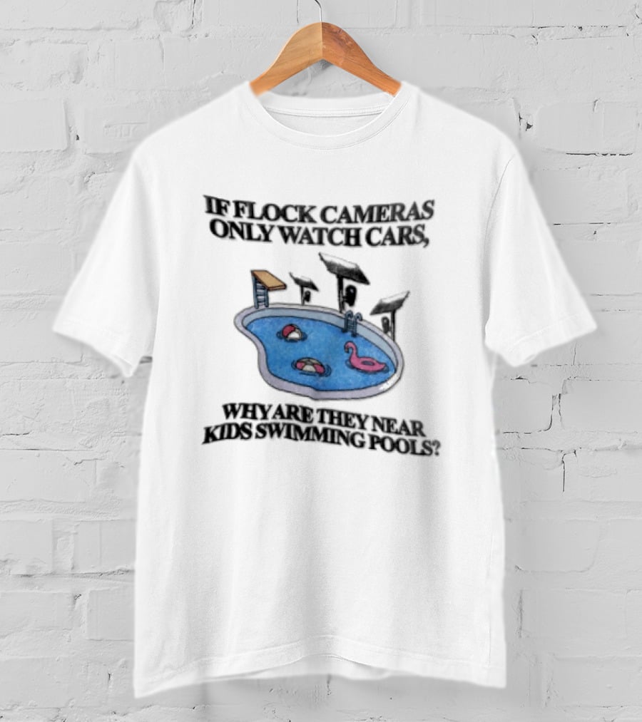 Flock Cameras Cars Near Swimming Pools Pink Flamingo Float Solar Panels Cartoon T-Shirt