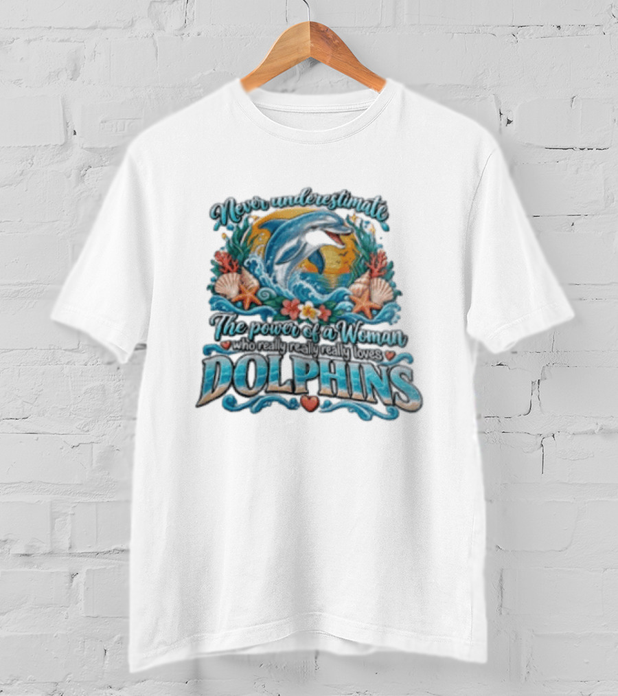 Never Underestimate The Power Of A Woman Who Really Loves Dolphins Ocean Waves Sunburst Shells T-Shirt