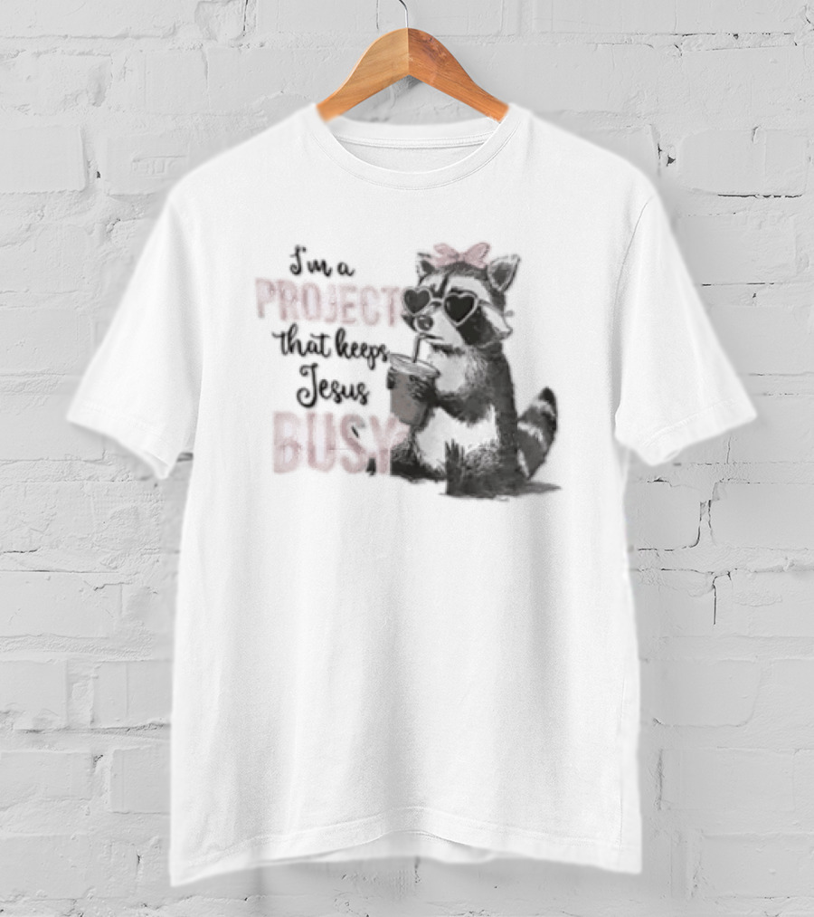 I'm A Project That Keeps Jesus Busy Raccoon Wearing Bow T-Shirt