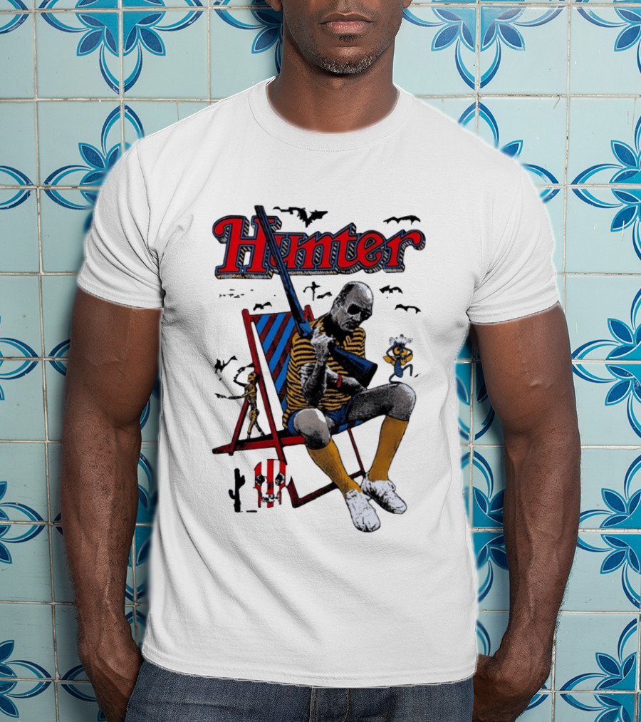 Hunter July 18 1937 February 20 2005 Man Holding Rifle Striped Chair Yellow Socks T-Shirt