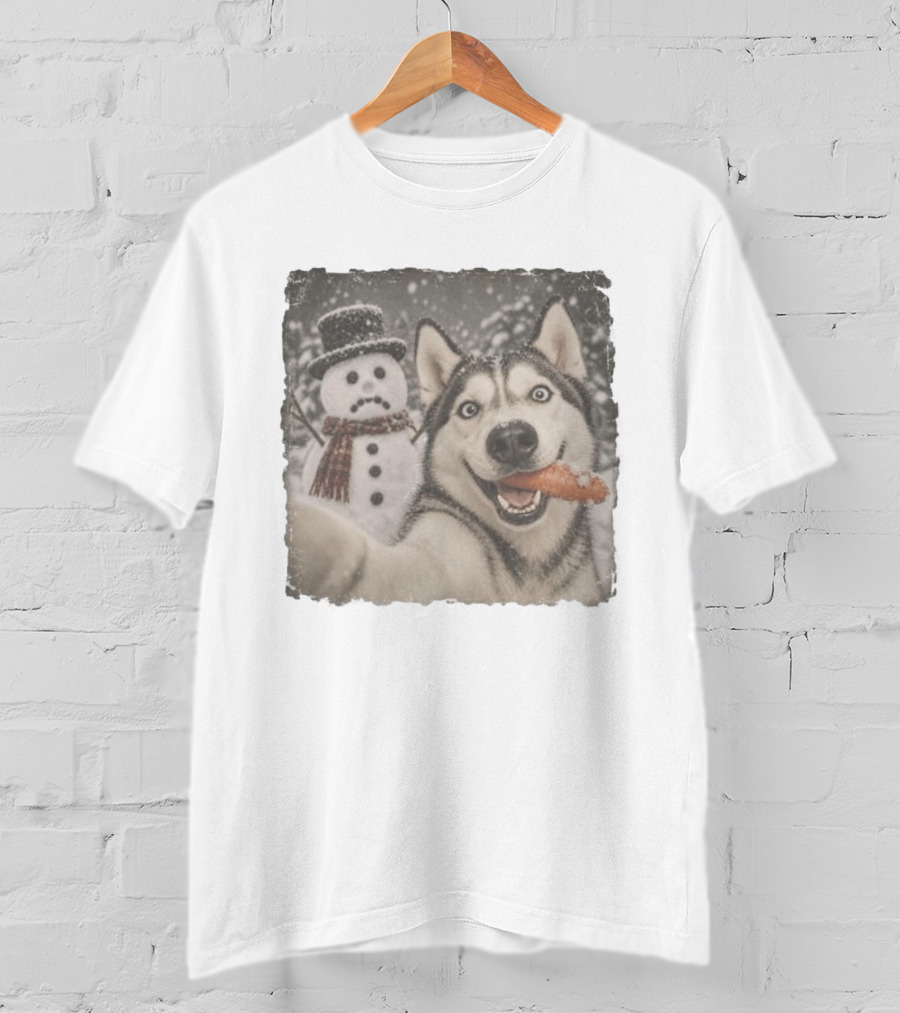 A Sled Dog With A Carrot And A Sad Snowman In A Snowy Winter Scene T-Shirt