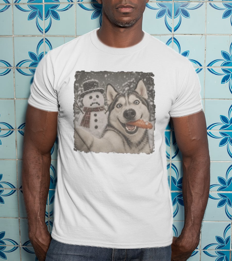 A Sled Dog With A Carrot And A Sad Snowman In A Snowy Winter Scene T-Shirt