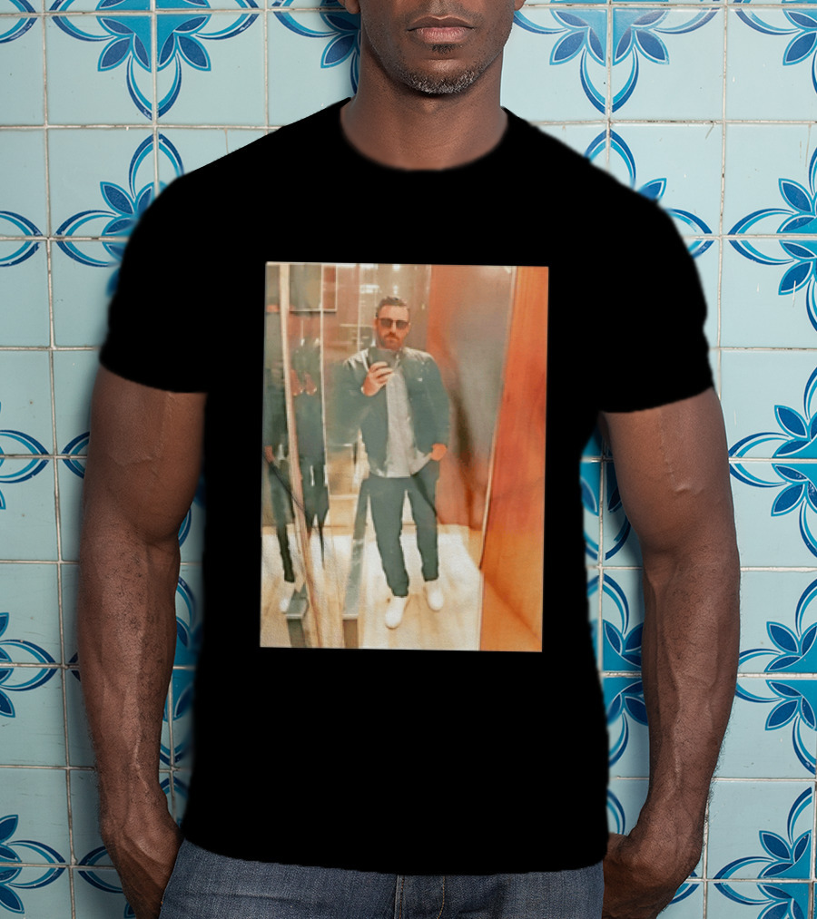 I'm Unable To Discern The Specific Visible Text Or Imagery On The In The Image. T-Shirt