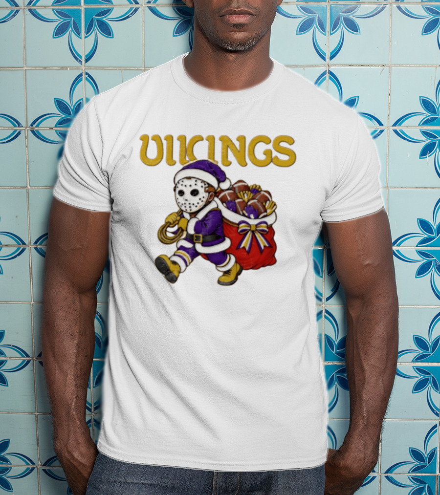 Minnesota Vikings Football Christmas Purple And Gold Santa Carrying Footballs T-Shirt