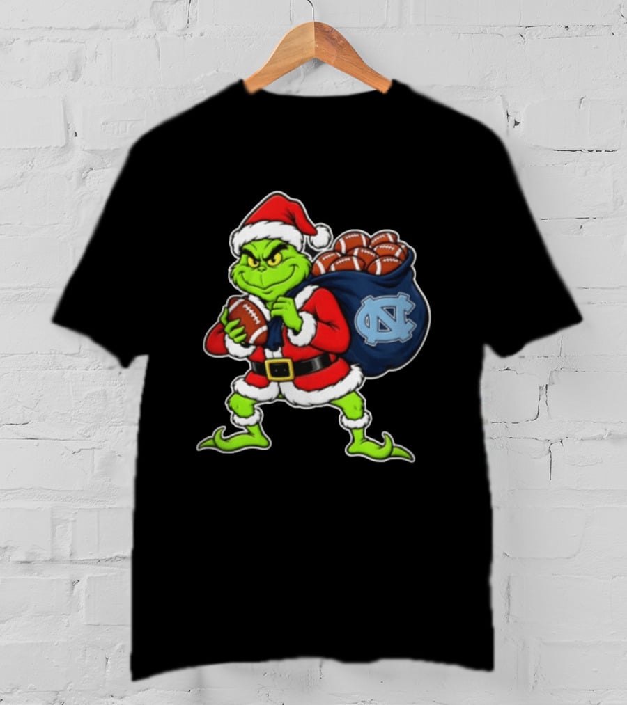 Grinch Santa North Carolina Tar Heels Holding Chiefs Footballs Christmas T-Shirt