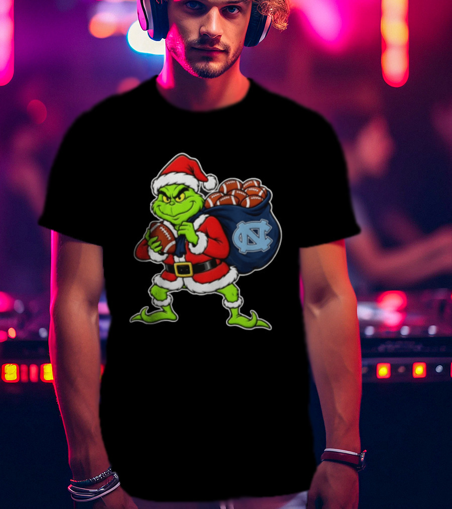 Grinch Santa North Carolina Tar Heels Holding Chiefs Footballs Christmas T-Shirt