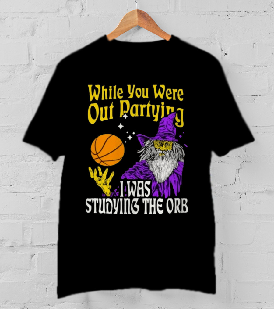 While You Were Out Partying I Was Studying The Orb Wizard Basketball T-Shirt