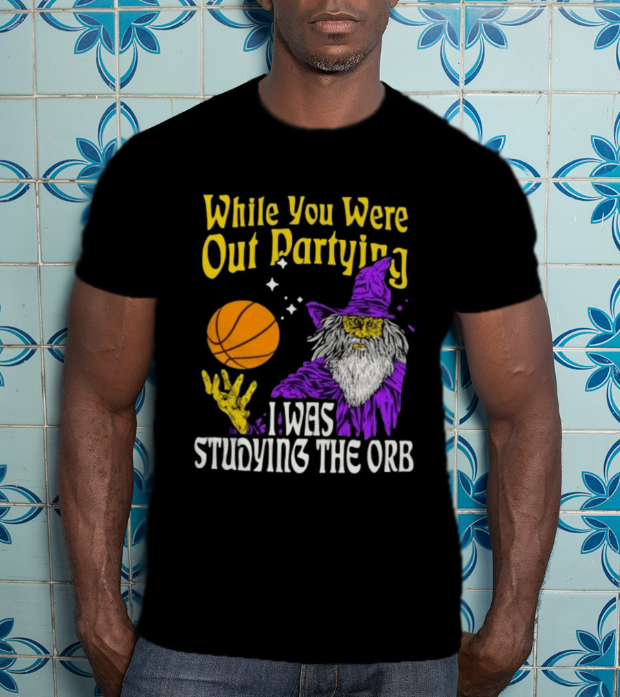 While You Were Out Partying I Was Studying The Orb Wizard Basketball T-Shirt