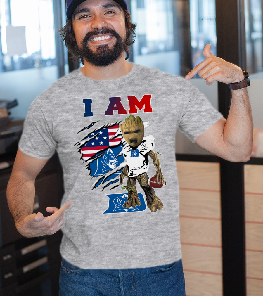 I AM Duke Baby Groot With American Football And Flag Background T-Shirt