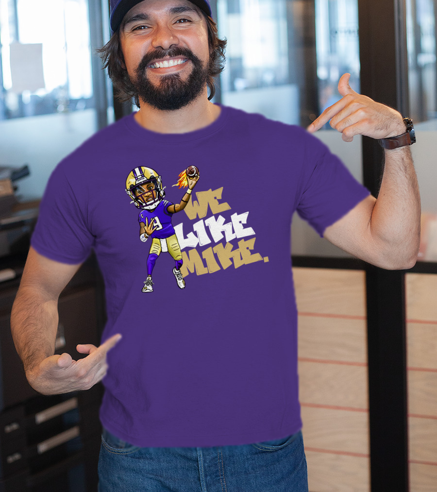 We Like Mike Football Character In Purple And Gold Gear Holding Flaming Ball T-Shirt