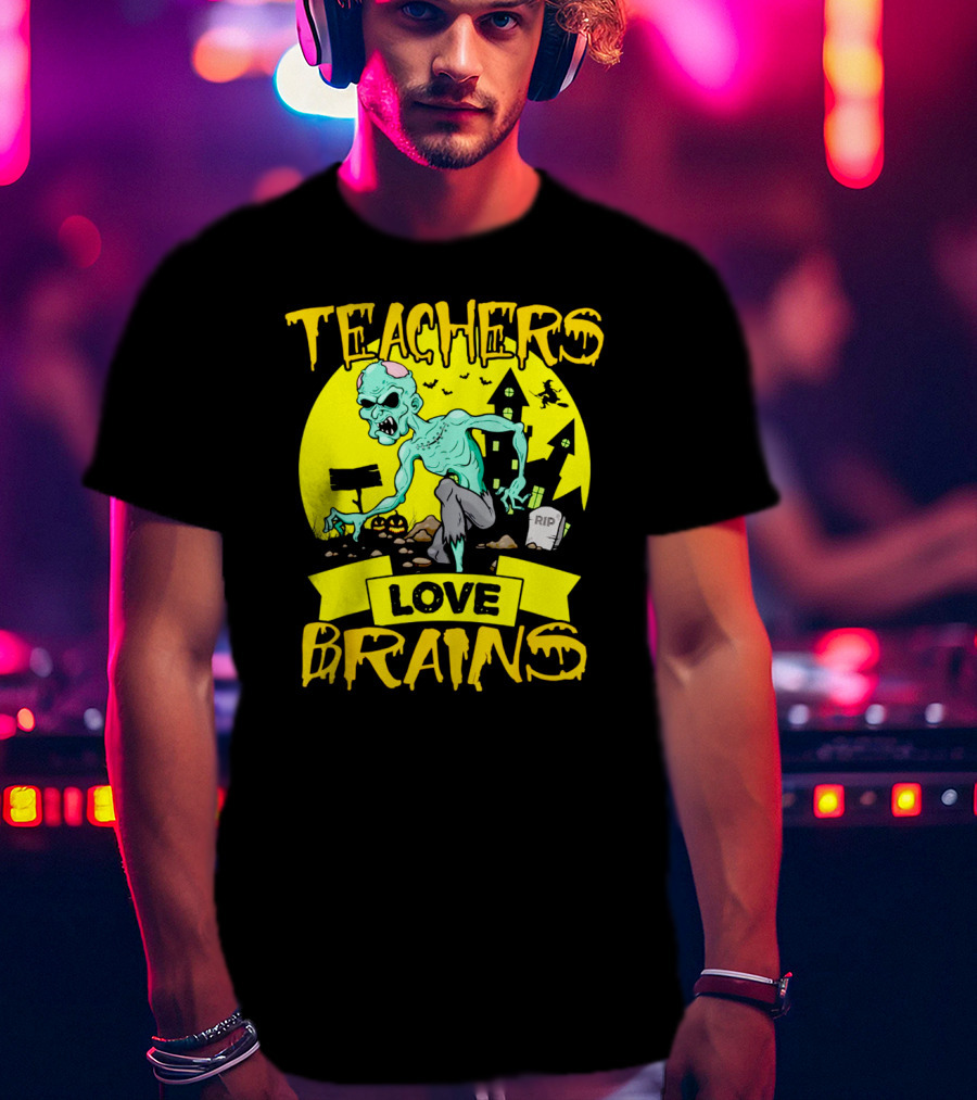 Teachers Love Brains Zombie Halloween Theme With Haunted Houses And Graveyard Background T-Shirt