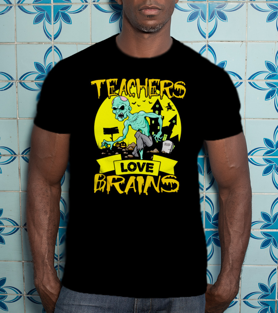Teachers Love Brains Zombie Halloween Theme With Haunted Houses And Graveyard Background T-Shirt