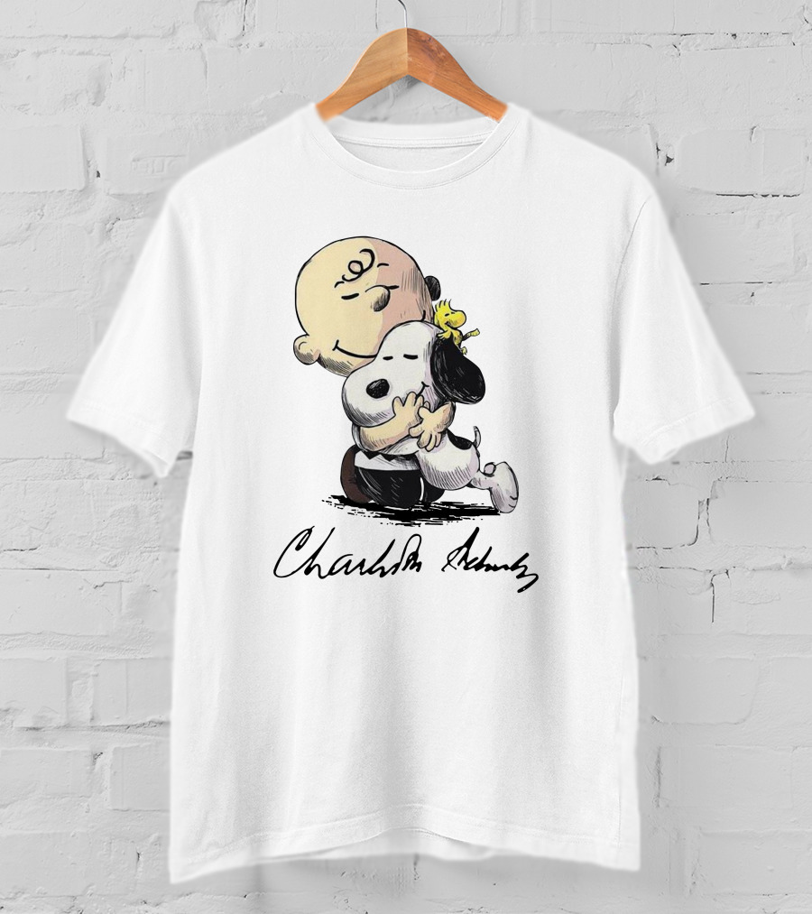 Peanuts Charlie Brown Snoopy Woodstock Hug By Charles Schulz T-Shirt