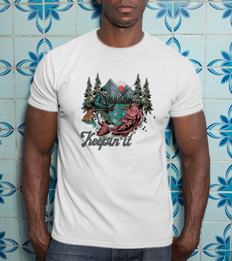 Keepin' It Reel Skeleton Fishing Adventure With Giant Fish And Mountain Lake Scene T-Shirt