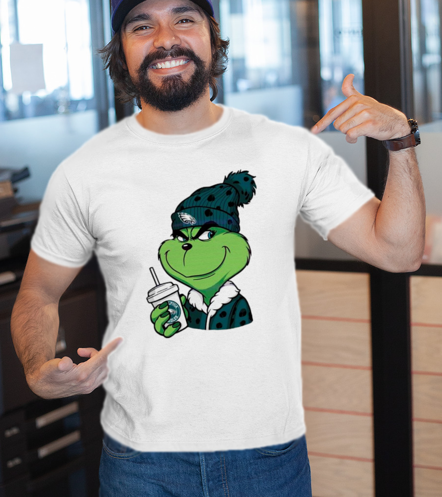 Grinch Holding Cup Wearing Philadelphia Eagles Beanie T-Shirt
