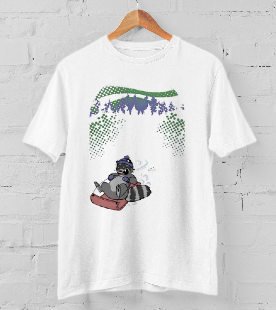 Raccoon Sledding In Winter Forest Scene With Evergreen Trees And Snowflakes T-Shirt