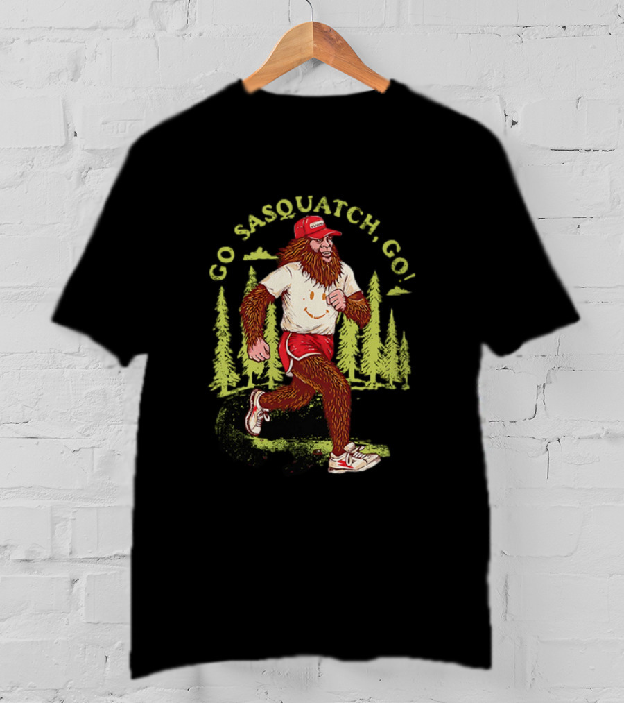 Go Sasquatch Go Bigfoot Jogging In Forest With Red Cap And Sneakers T-Shirt