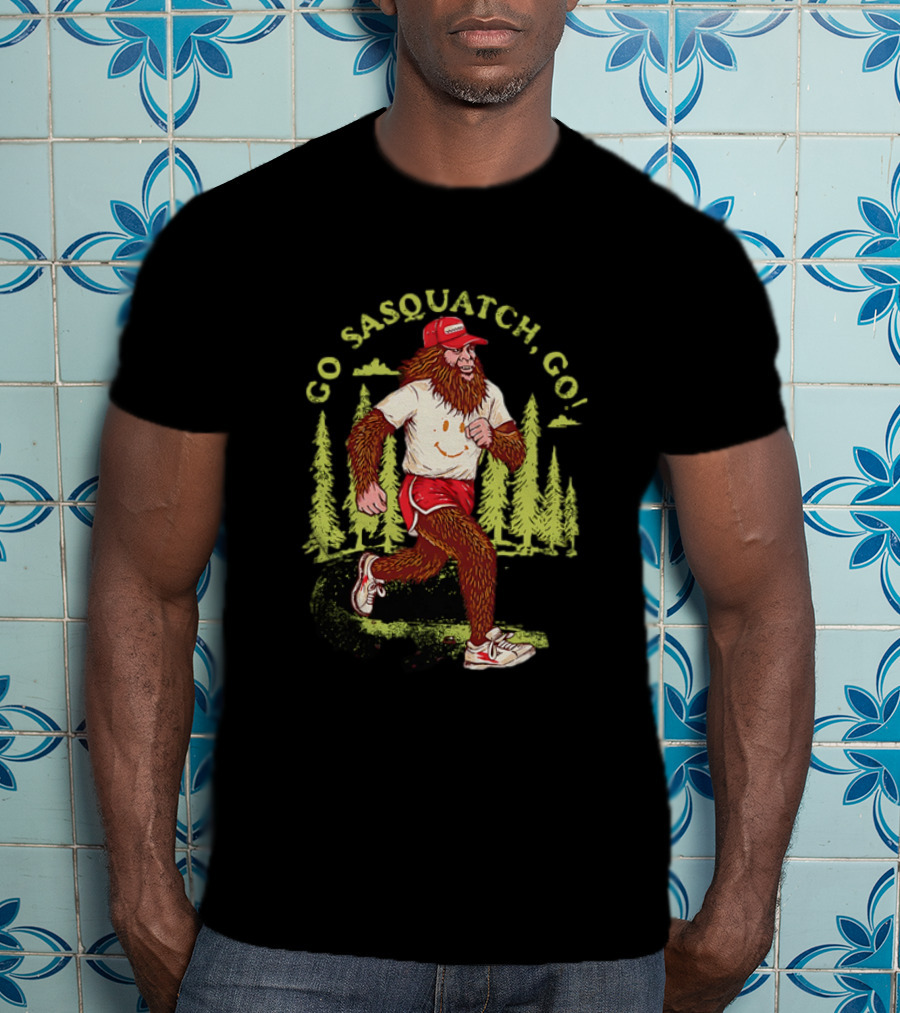 Go Sasquatch Go Bigfoot Jogging In Forest With Red Cap And Sneakers T-Shirt