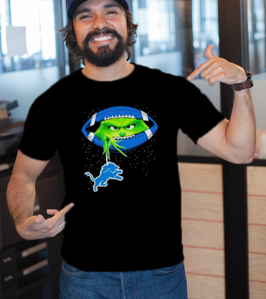 Grinch Holding Detroit Lions Logo Inside Football Christmas T-Shirt