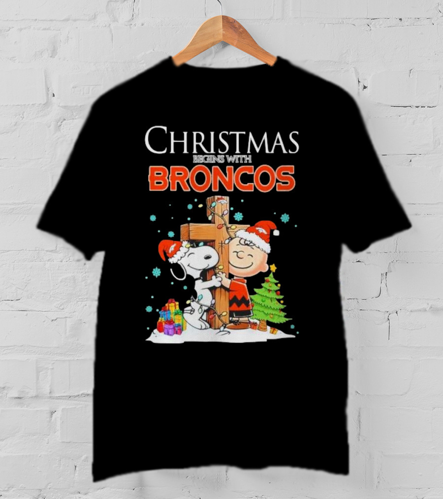 Christmas Begins With Broncos Charlie Brown Snoopy Hug Cross T-Shirt