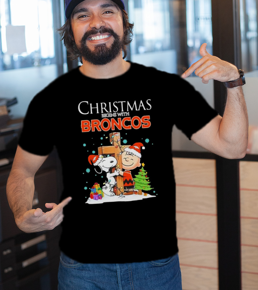 Christmas Begins With Broncos Charlie Brown Snoopy Hug Cross T-Shirt