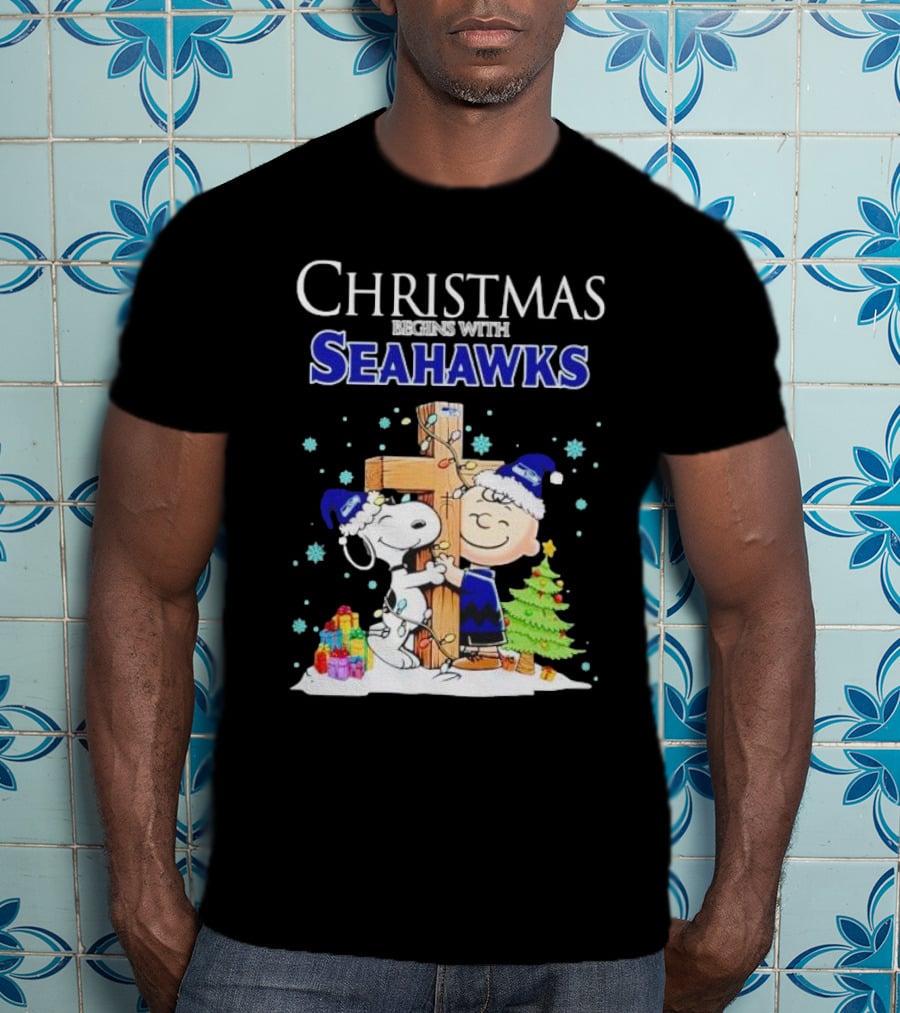 Christmas Begins With Seahawks Charlie Brown Snoopy Jesus Cross T-Shirt