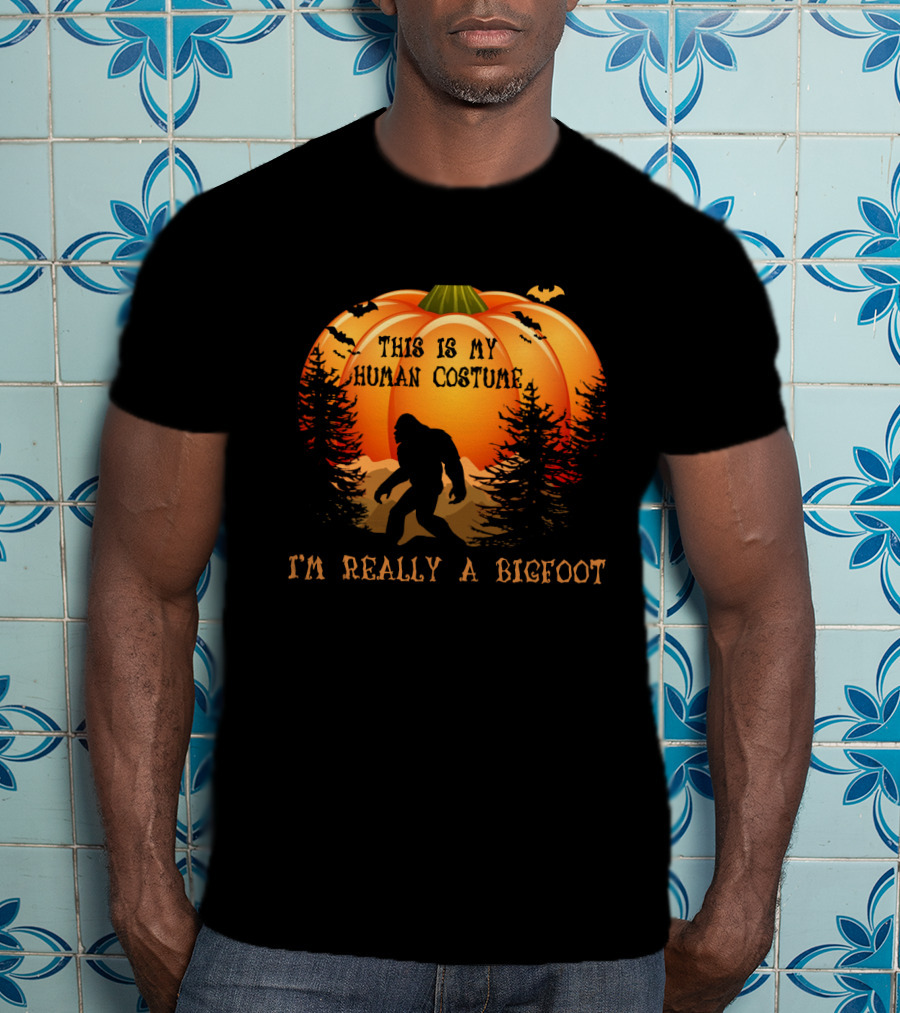 This Is My Human Costume I'm Really A Bigfoot Halloween Pumpkin Silhouette With Bats And Trees T-Shirt