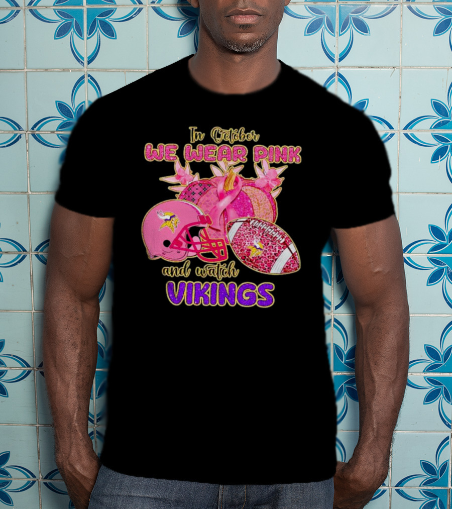 In October We Wear Pink And Watch Vikings Football Helmets Breast Cancer Awareness T-Shirt