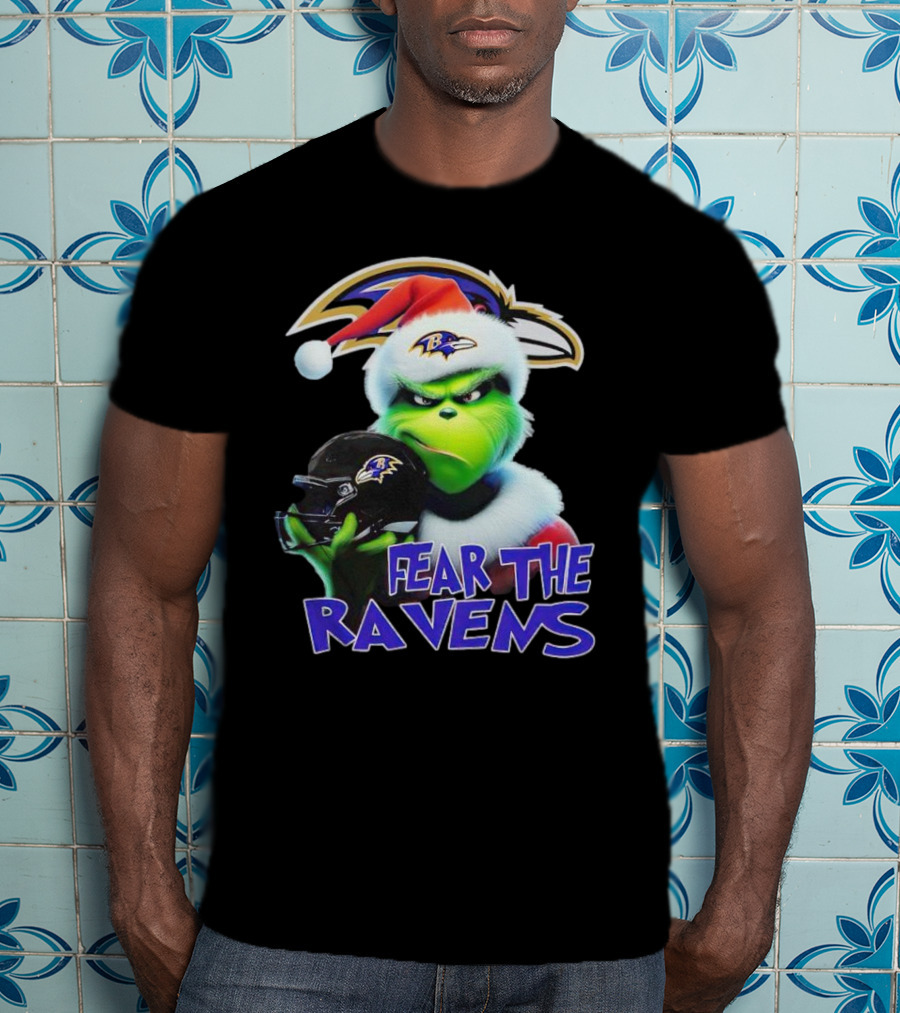 Grinch Wearing Santa Hat Holding Baltimore Ravens Helmet Fear The Ravens T-Shirt
