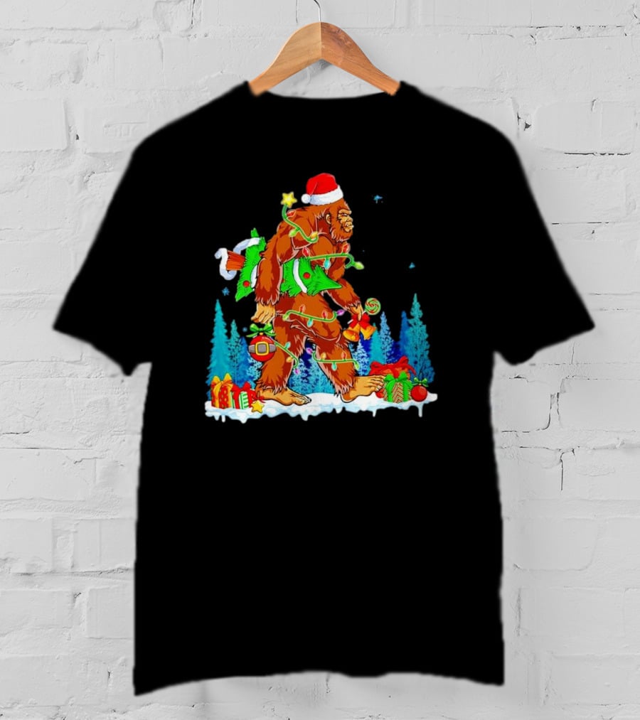 Bigfoot Santa Hugging Christmas Tree With Gifts And Snow Scene T-Shirt