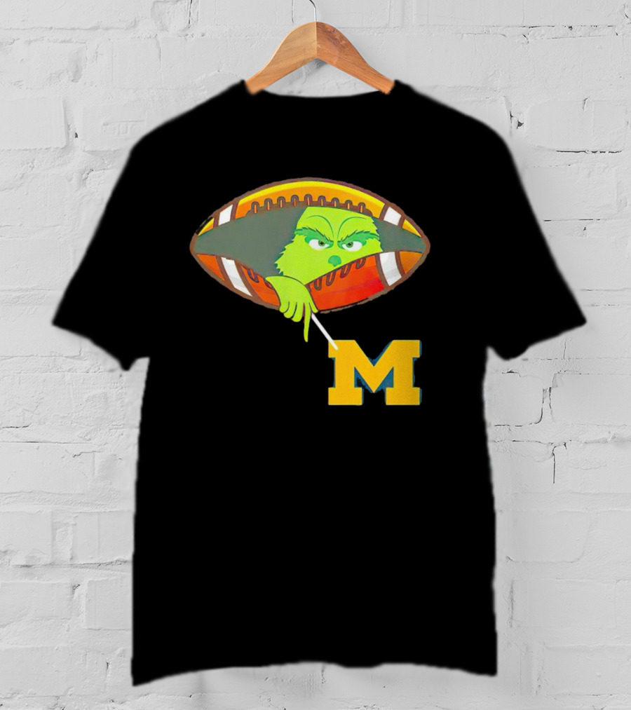Grinch Peeking From Football Over Michigan Wolverines T-Shirt